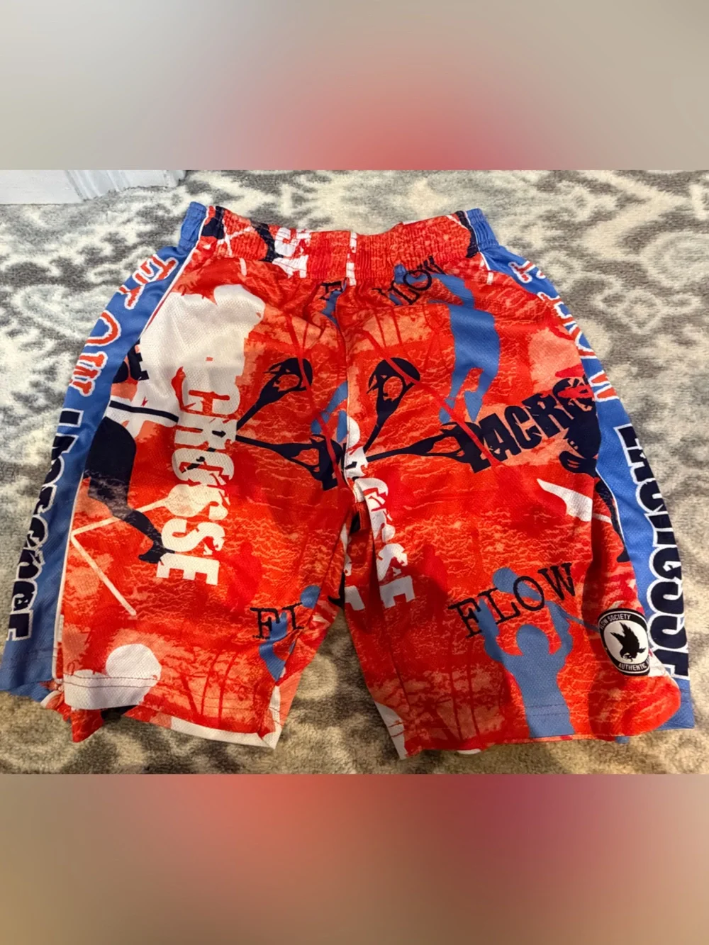 Boys' Red Graphic Swim Shorts with Blue Accents